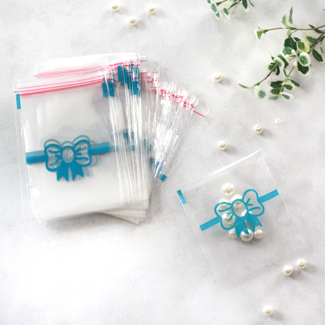 100 adet mavi fiyonk desenli bantlı şeffaf poşet / 10x15 cm - Bimotif (1)