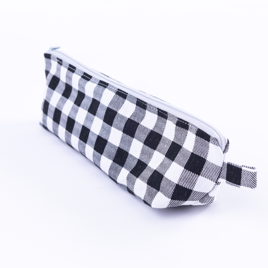 Checked black coloured pencil case with zip fastener - 1